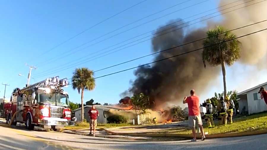 Firefighters from Brevard County, Indialantic, Melbourne and Indian Harbour Beach attack the fire.
