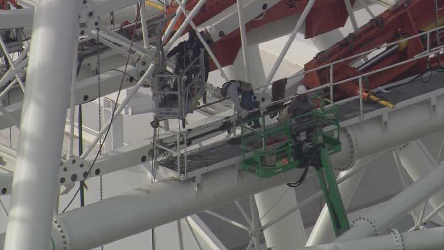 A Construction worker briefly became stuck on a platform while working on the soon-to-come Orlando Eye attraction on International Drive.