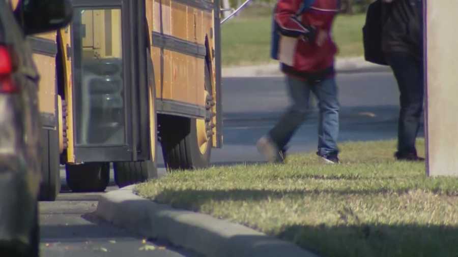 A 12-year-old boy was critically injured after being struck by a car while trying to catch a school bus in Osceola County, according to the Florida Highway Patrol.
