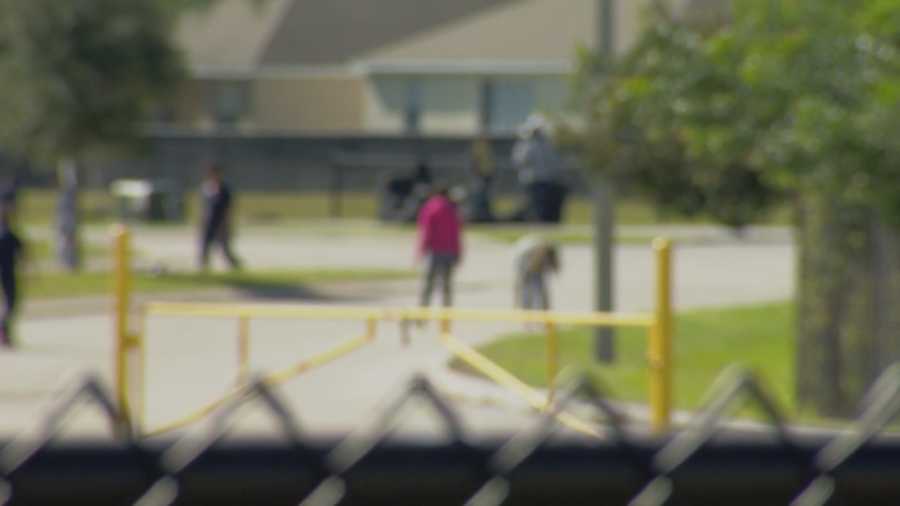 A teacher's assistant at Flora Ridge Elementary School in Kissimmee has been charged with child abuse after shaking a student Thursday, police said.