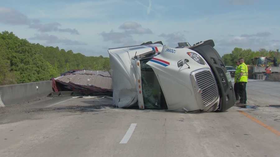An overturned semi-truck prompted road closures on Interstate 95 in Volusia County Thursday.