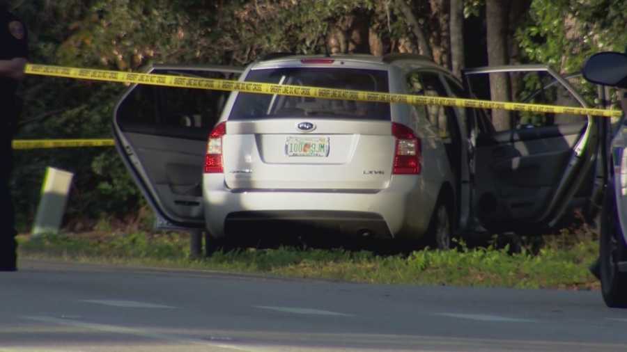 Two people are under arrest two months after a woman was found shot to death in an SUV in Eustis.