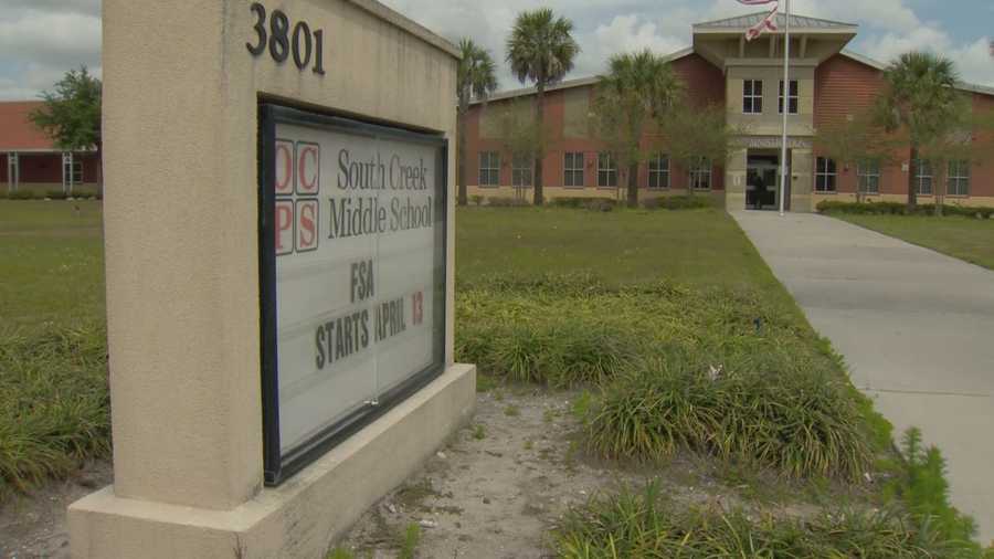 A middle school was placed on a brief lockdown Thursday after a teacher was attacked in a "domestic incident," according to the Orange County Sheriff's Office.