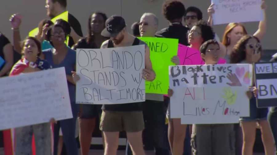 Protesters spread their message in downtown Orlando voicing concerns about those killed in police custody.