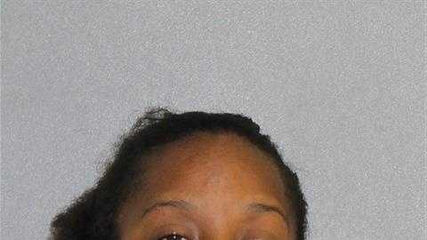 Police: Woman passed out with kids in back seat of car