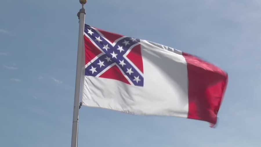 The local NAACP and other groups organized this demonstration outside the McPherson Governmental Complex to try to compel county commissioners to change their minds, and place the Confederate flag in a museum away from administration property.