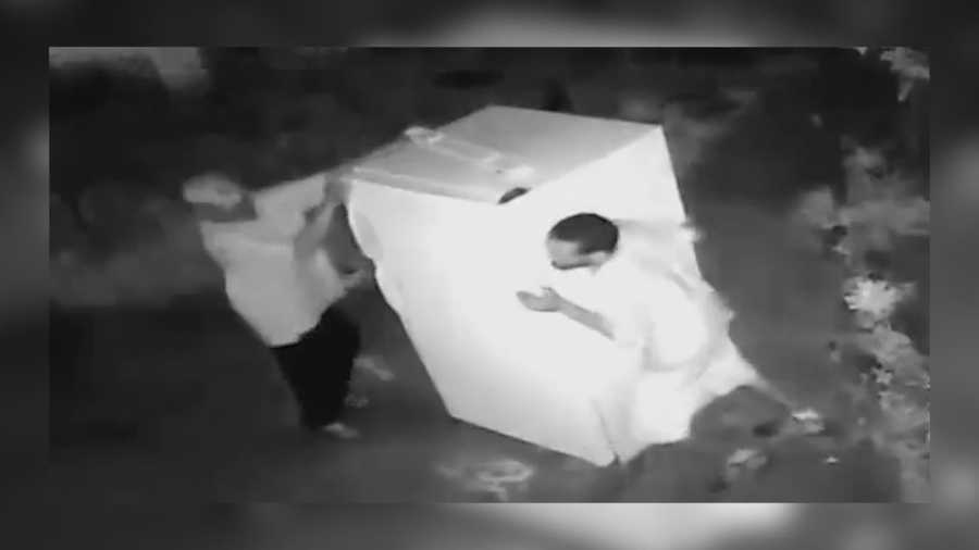 Surveillance video shows the men stealing a white refrigerator from the Community House of Prayer in Sanford. No arrests have been made so far.