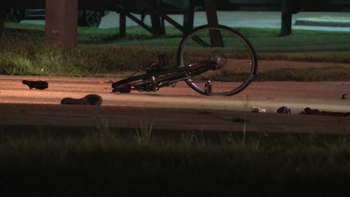 Bicyclist in critical condition after being struck by police car