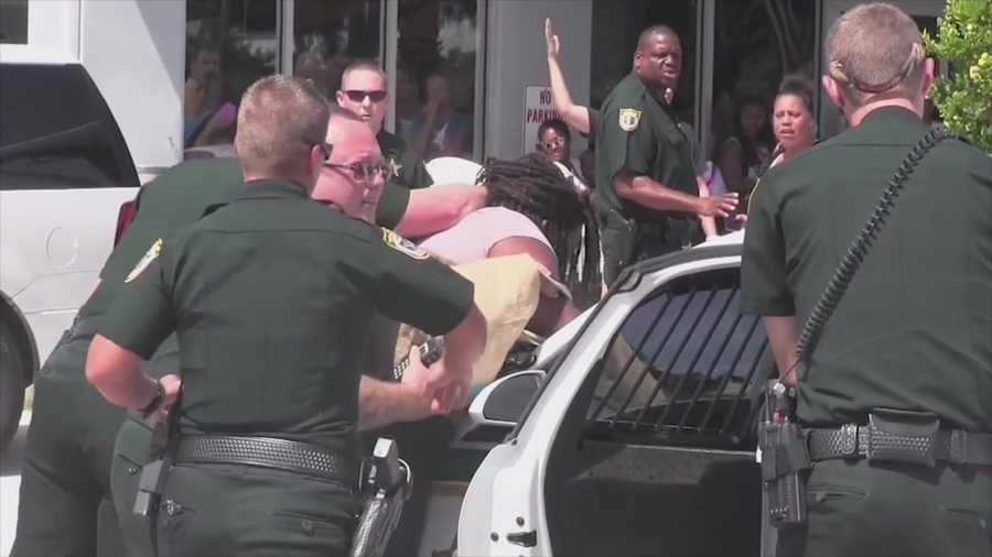 Witnesses say brawlers attacked Brevard County sheriff's deputies and deputies responded with force.
