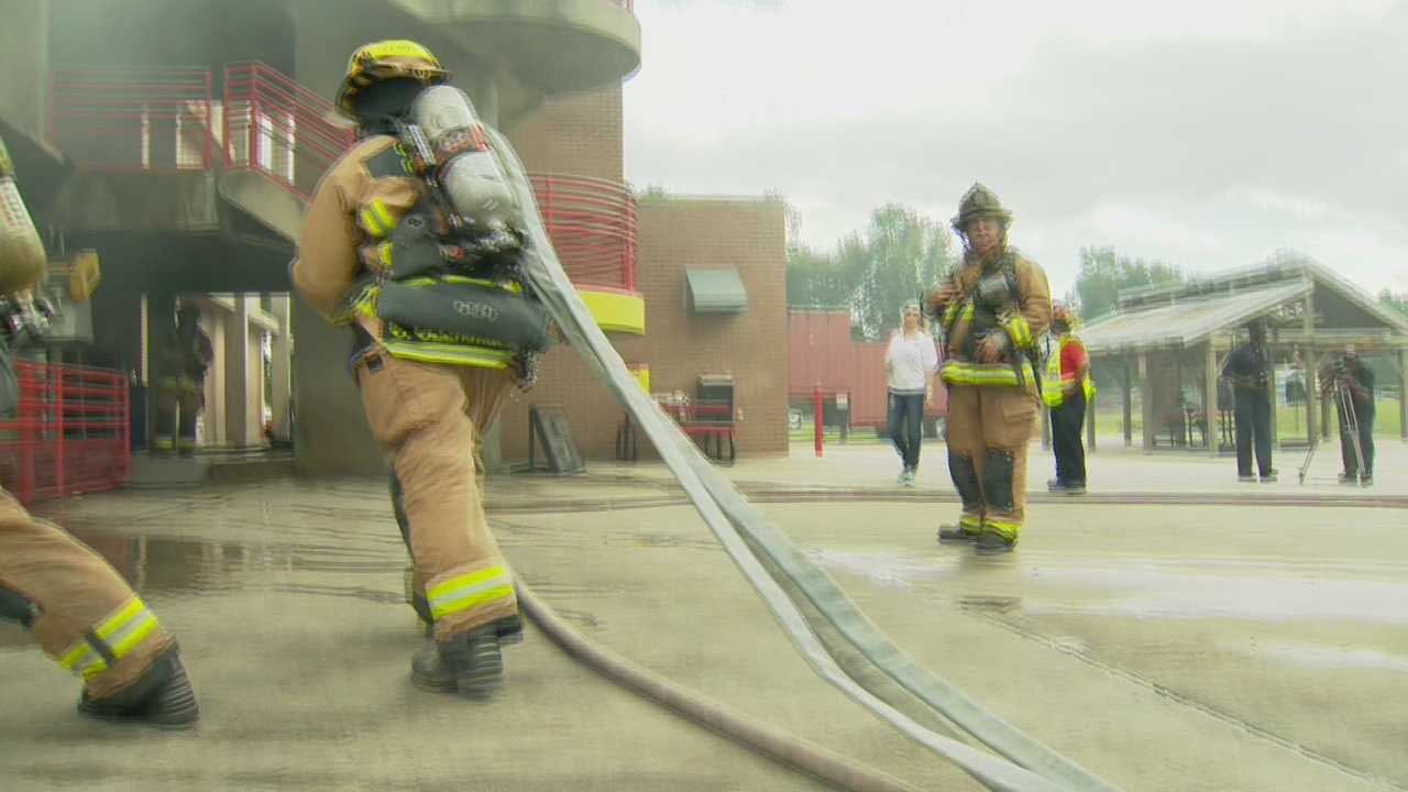 French firemen hazing a juvenile trainee
