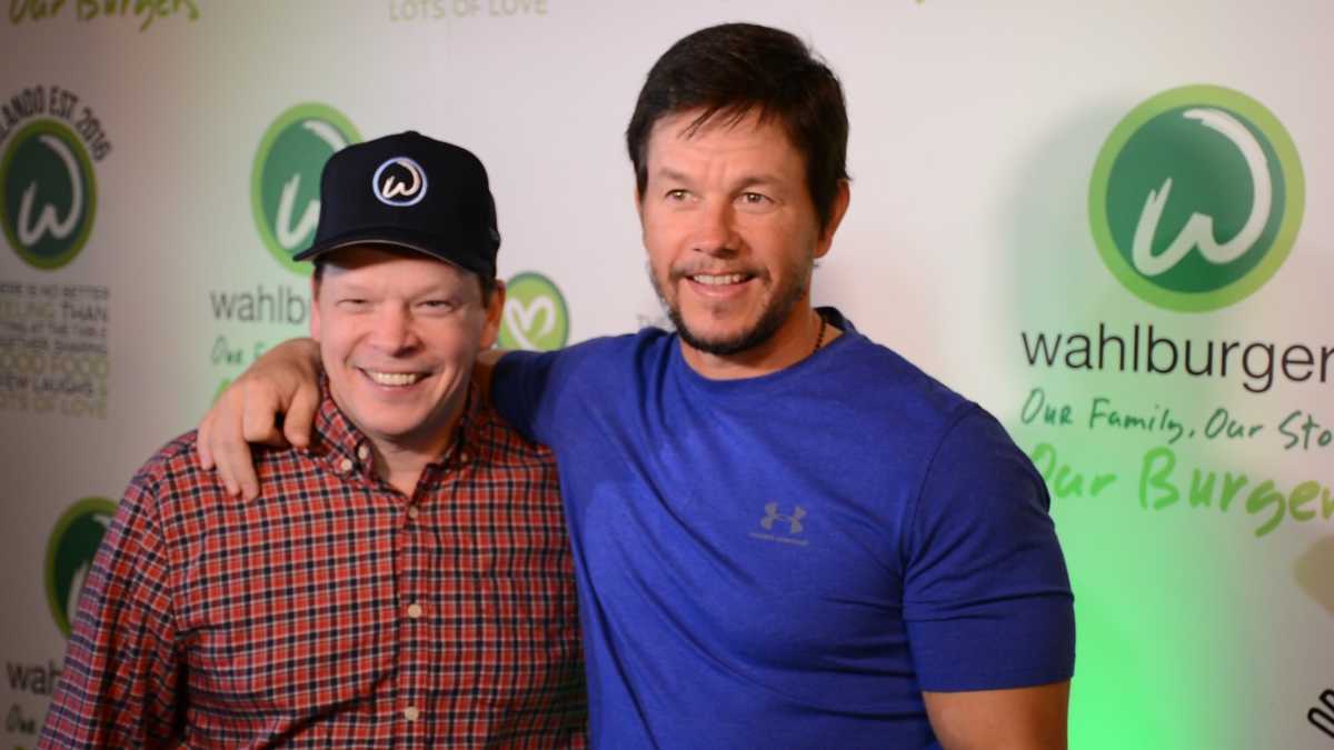 Mark and Paul Wahlberg open Wahlburgers Orlando