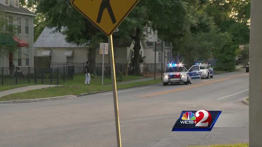 One Orlando mom is hospitalized and another is in jail after gunshots were fired during an argument Wednesday.