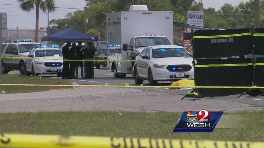 An armed robbery suspect was shot to death Sunday afternoon in an encounter with Volusia County Sheriff's deputies in DeLand.