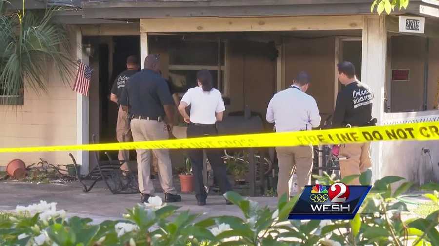Orlando firefighters pulled a woman from a burning home Thursday morning.