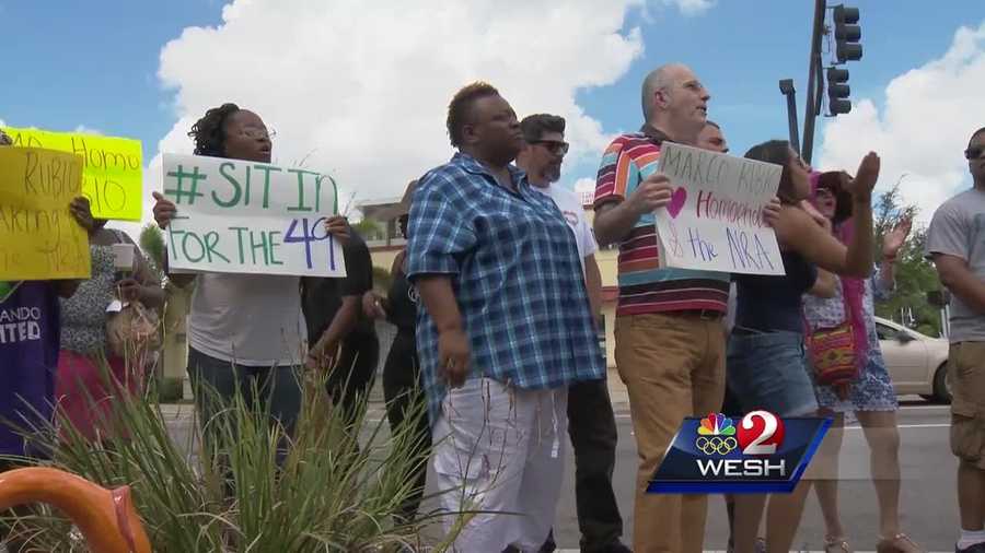 Sen. Marco Rubio met with an owner of a business recovering from the effects of the massacre at nearby Pulse nightclub. But outside, protesters showed that they remained unsatisfied with the recovery attempt for LGBTQ rights.