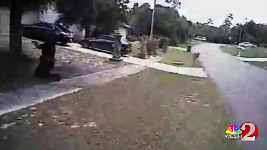 Body cam video shows a deputy rescuing a shooting victim and two children during a shootout Sunday in Deltona.