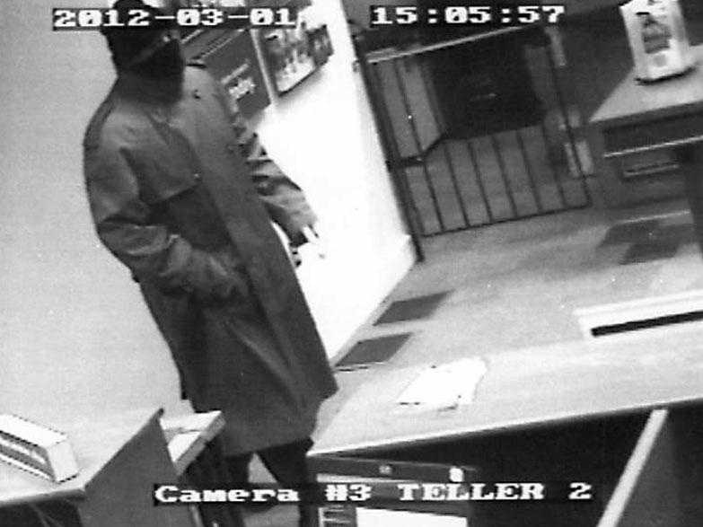 See Surveillance Photos Of Bank Robbery Suspect 