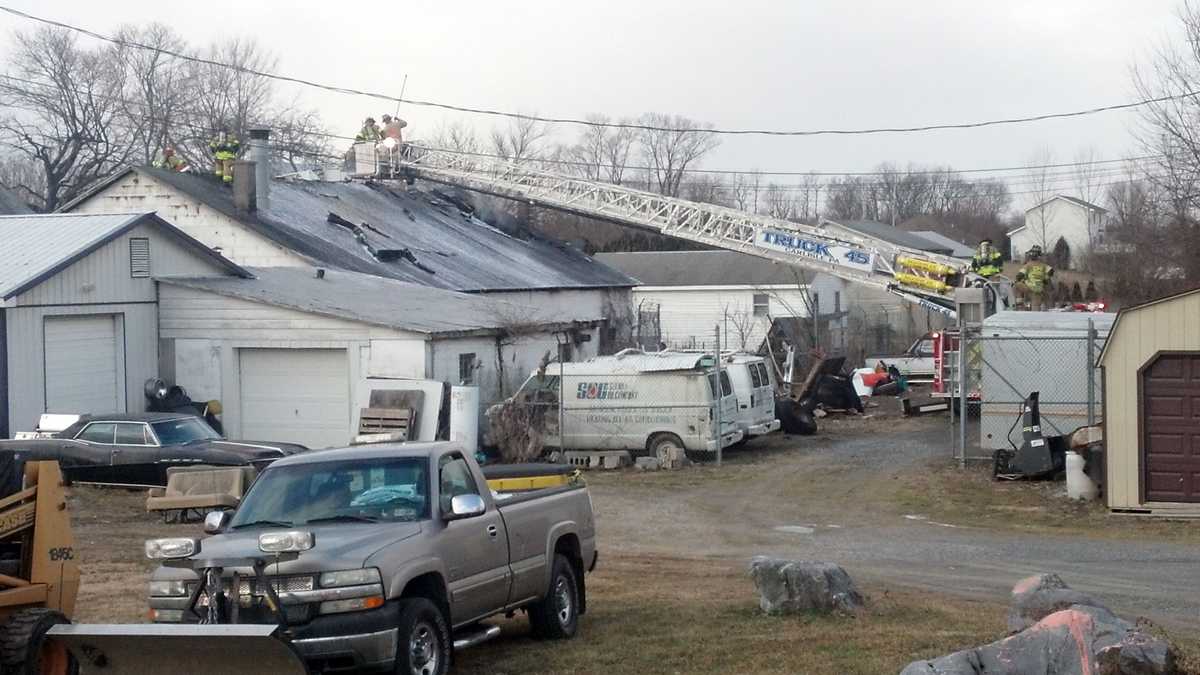 No one injured in auto body shop fire