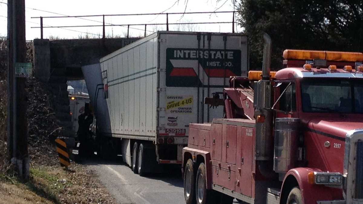 Truck Gets Stuck Under Railroad Bridge 9890