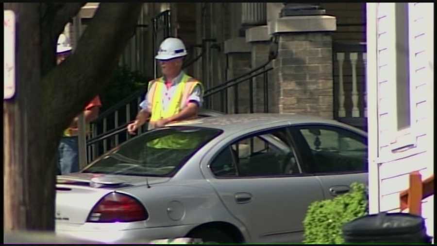 A car slams into a gas line, breaking it open and forcing a neighborhood evacuation in Lancaster on Tuesday afternoon.