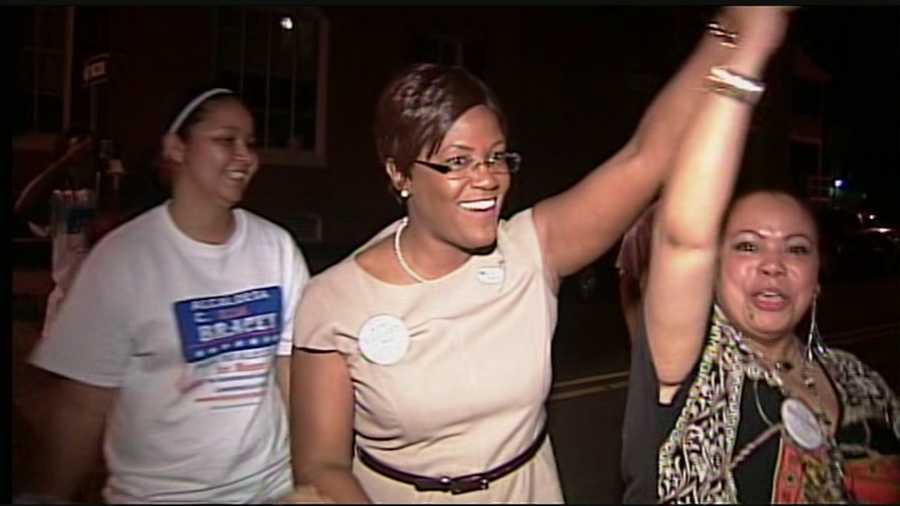 Incumbent Mayor Kim Bracey raises her hand high after winning her primary race in the city of York.