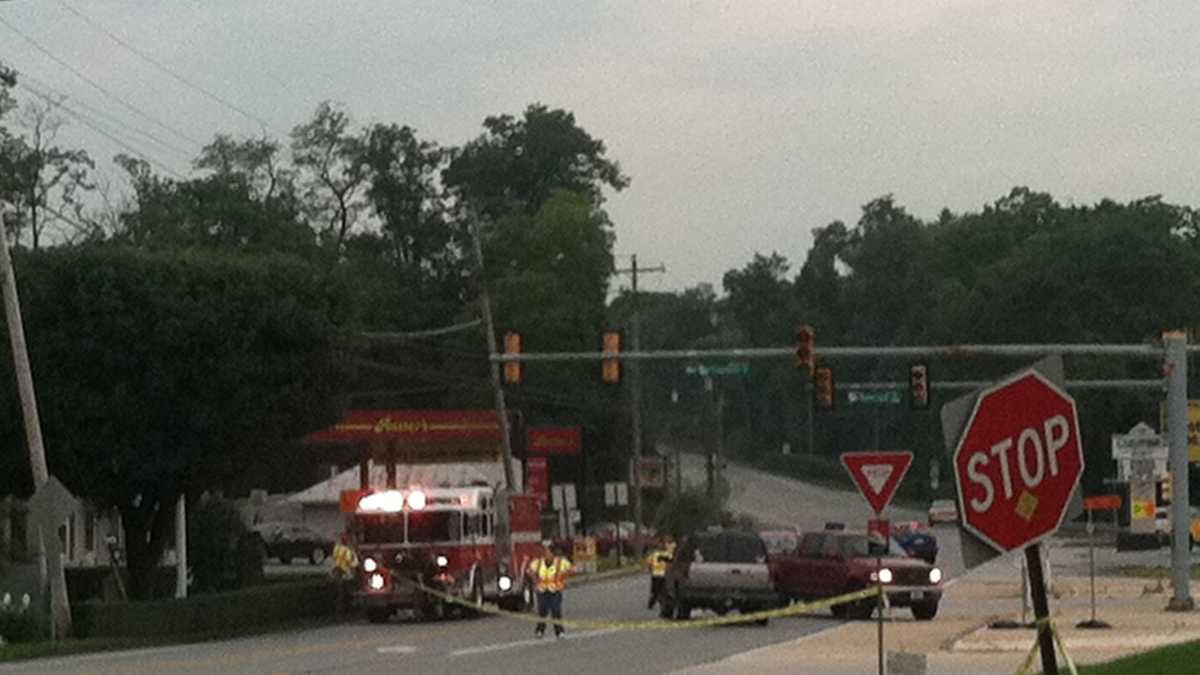 Photos: Truck crashes through pole