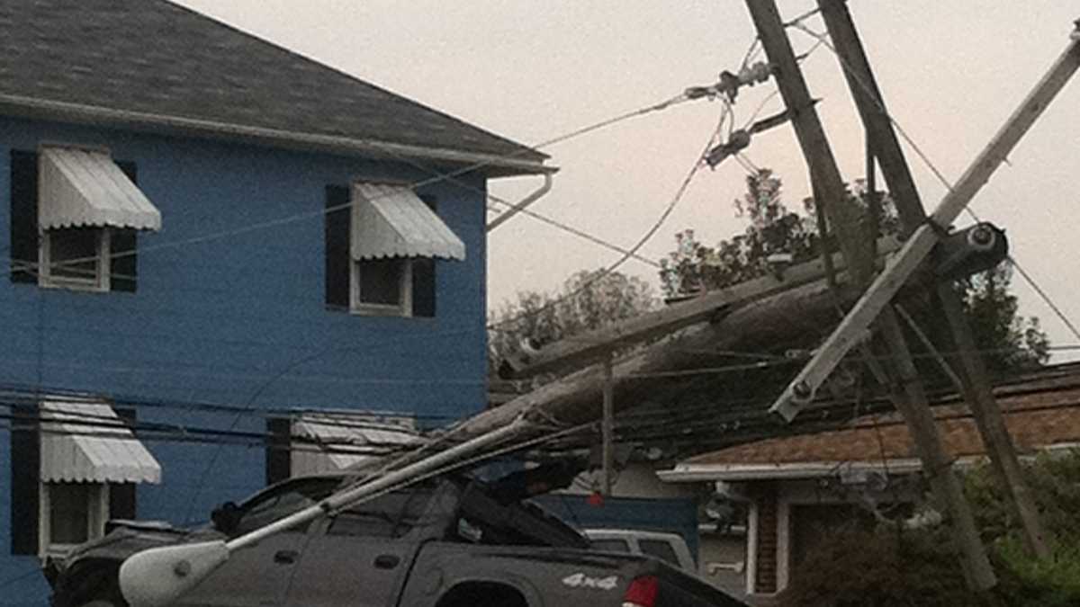 Photos: Truck crashes through pole
