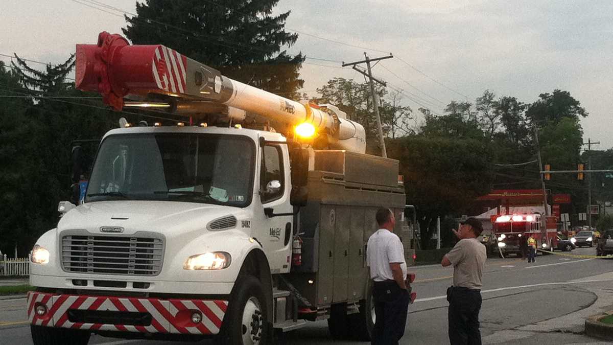Photos: Truck crashes through pole