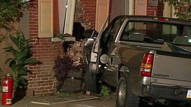 Lancaster police said no one was hurt when a pickup truck smashed into a row home Sunday night at the corner of North Ann and East Marion streets.