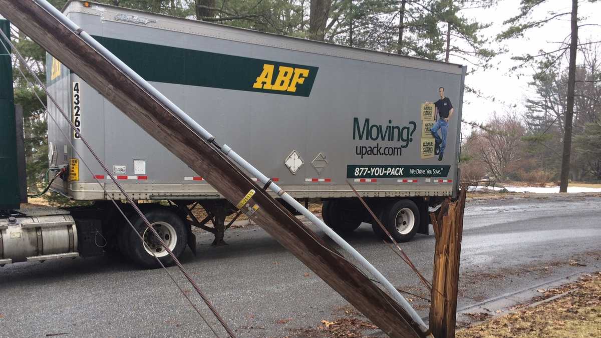 Truck pulls down wires, snaps utility pole
