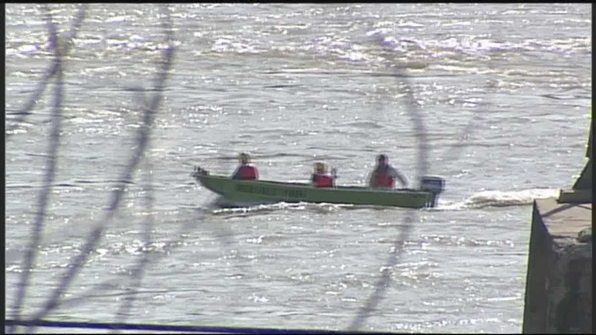 Photos: Family of five rescued from river