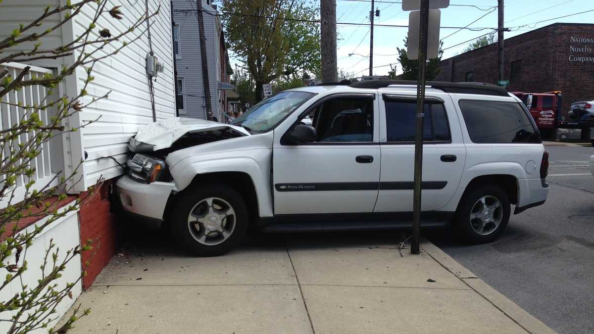 Photos: Car crashes into home in Lancaster