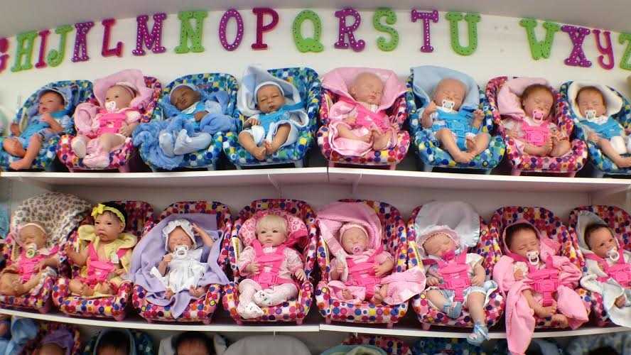 Photos 'Doll Outlet' home to 5,000 antique, lifelike dolls