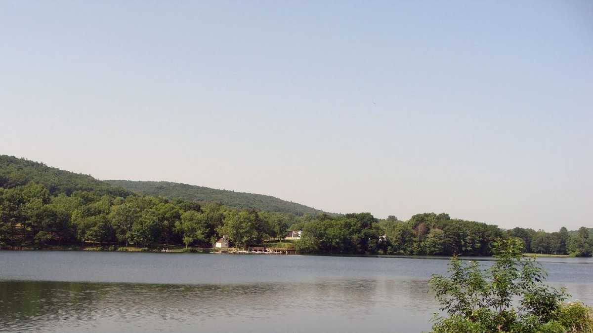 Boat, fish at Holman Lake