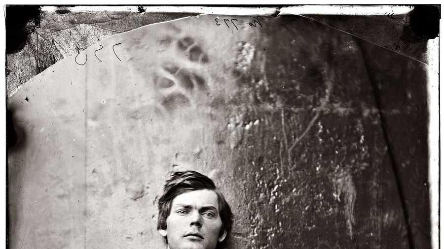 This veteran of the Battle of Gettysburg, Lewis Powell, shown here in shackles inside a U.S. warship, was one of four people hanged for the Lincoln assassination conspiracy.