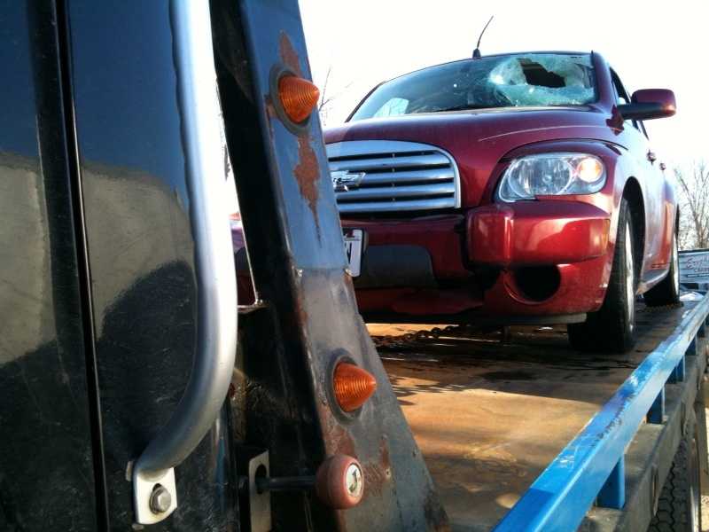 Photos Car struck by airborne tire