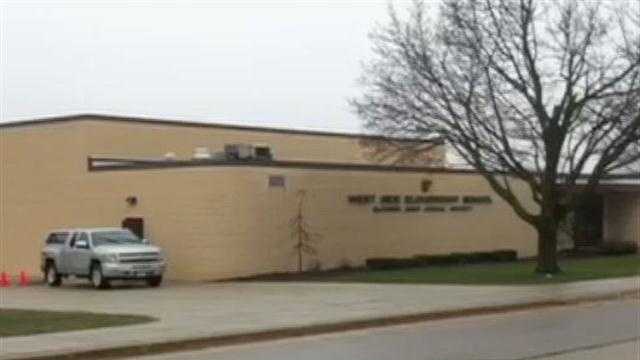 West Side Elementary in Elkhorn had to cancel classes Thursday after heavy rains causes flooding inside the school