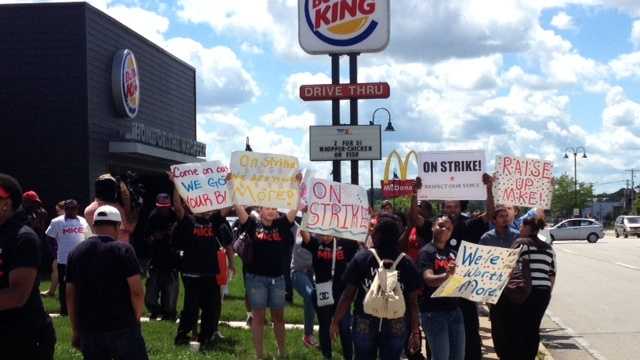 Fast food workers protest on Aug. 1, 2013 outside a Burger King at 76th and Holmes.