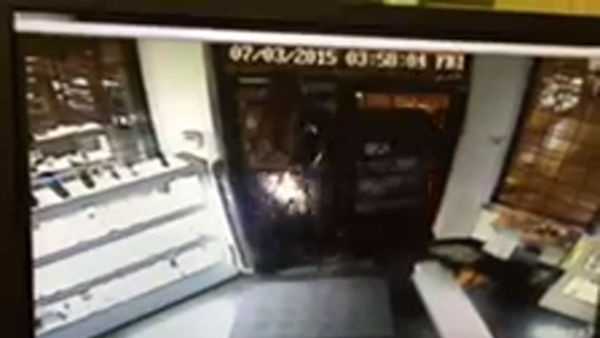 Surveillance video shows a minivan smashing into Bouchard's.