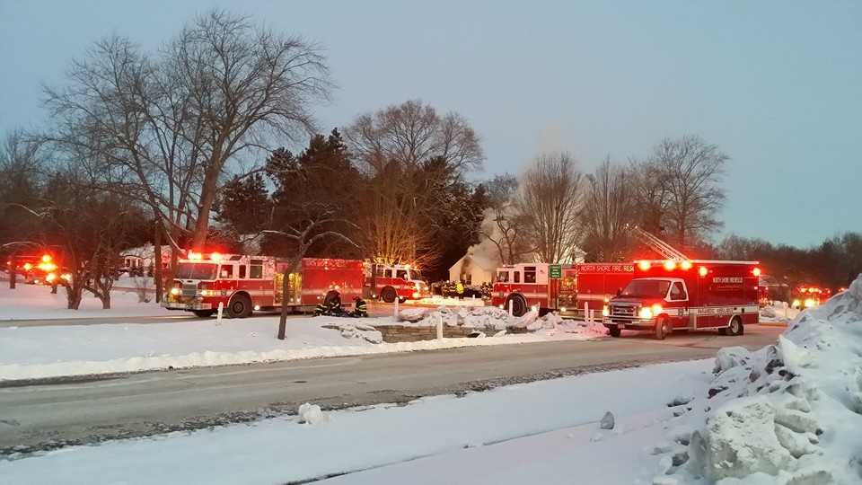 Firefighters battle Fox Point house fire in bitter cold