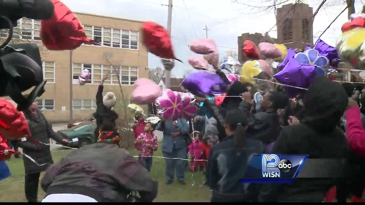 Family holds vigil in honor of mother shot by toddler son