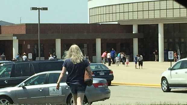 Parents lined-up outside Mahone Middle School in Kenosha to pick up children after a threat was discovered to Pleasant Prairie Elementary School. 