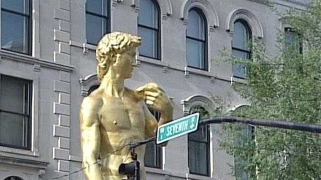 Giant golden statue turns heads in downtown Louisville