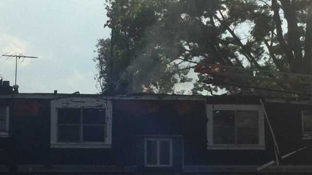 Images: Lightning strike ignites apartment fire