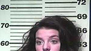 Woman facing murder charge in boyfriend's death