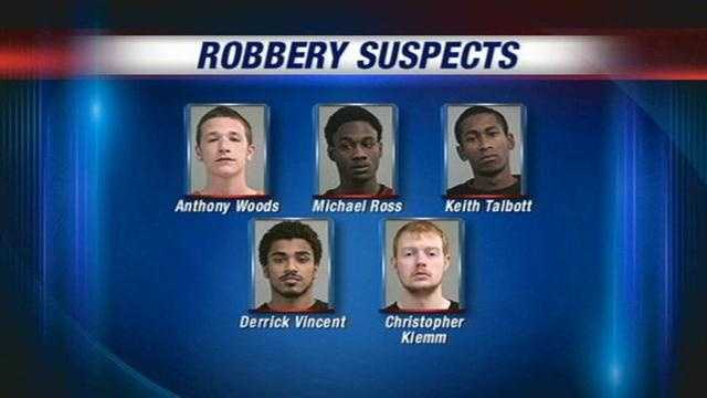Five men arrested in connection with robbery spree