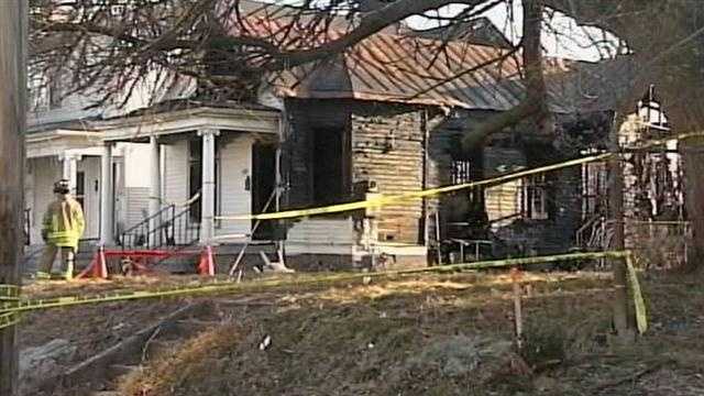 Police: Woman found in burning home was slain