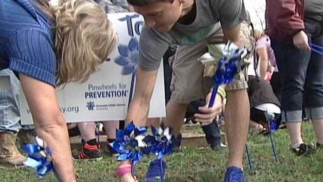 Students at Bullitt Central High School placed more than 200 pinwheels on campus Wednesday.
