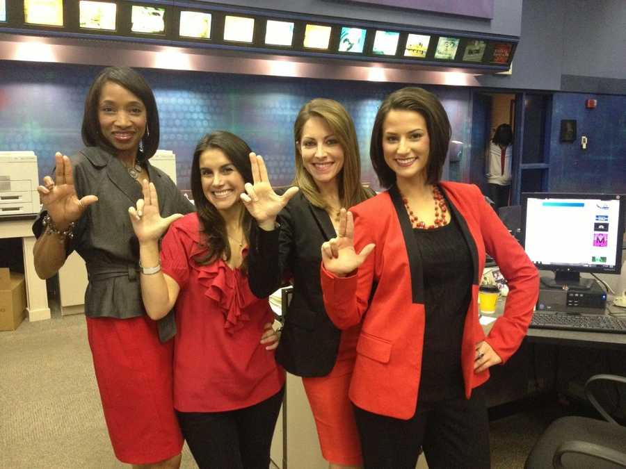 ann connect (1).JPG Ann Bowdan, Marissa Alter, Christina Mora and Erica Coghill wear red ahead of the Louisville Cardinals' appearance in the 2013 NCAA basketball national championship game