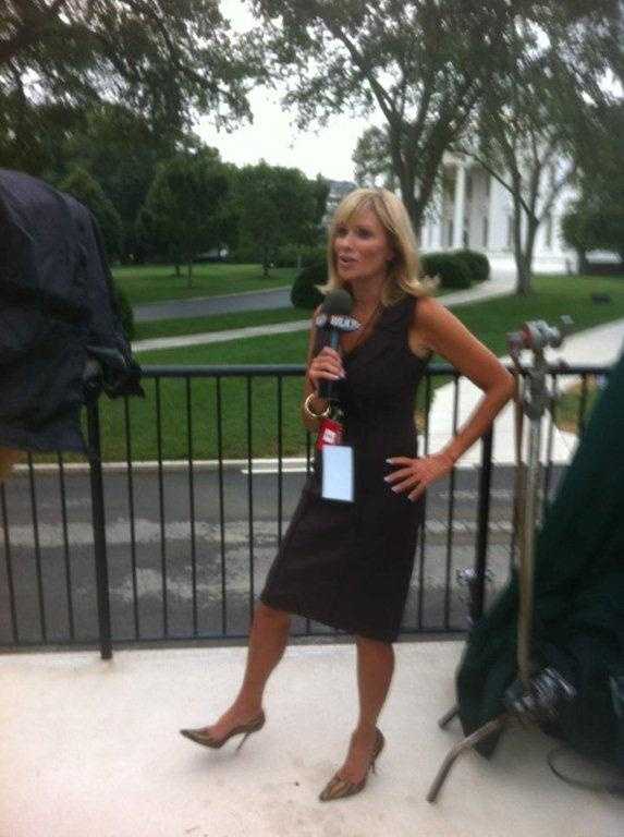 white house.jpg Vicki prepares for a live shot at the White House in summer 2012.
